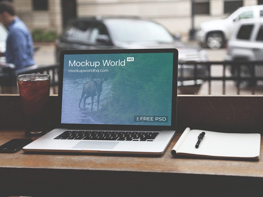 Free-MacBook-on-Table-PSD-Mockup