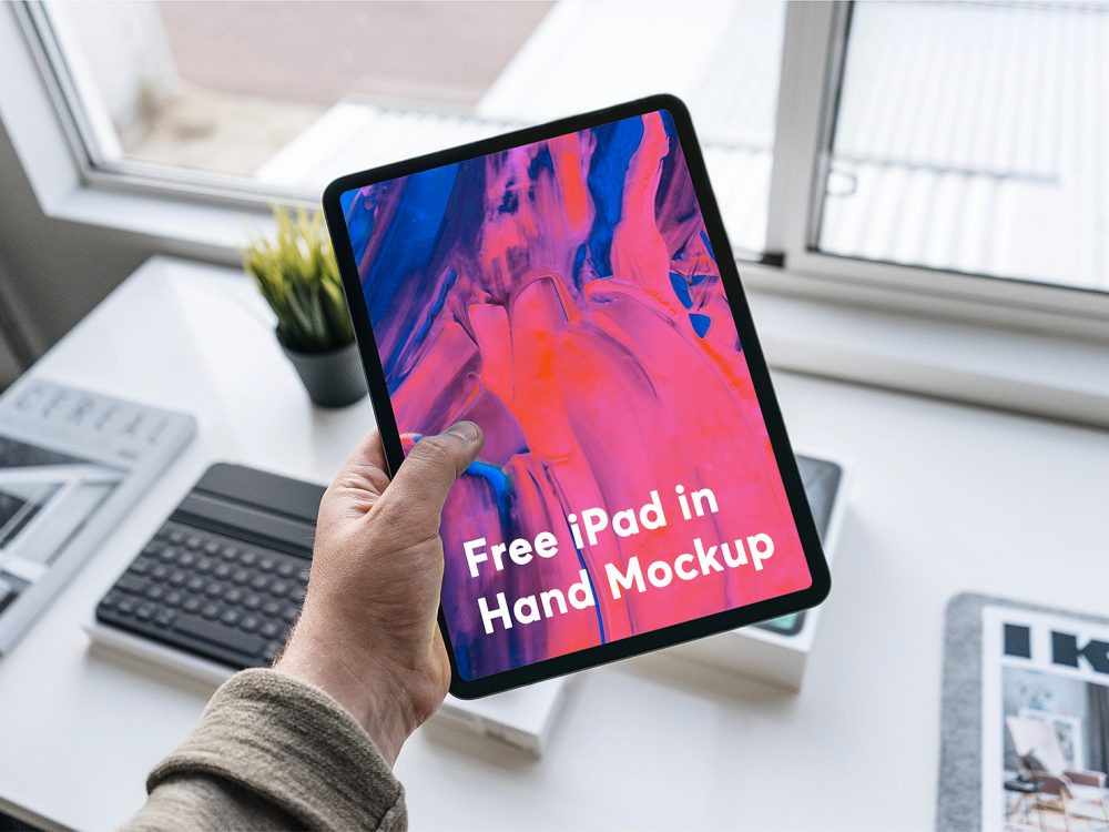 Free iPad Pro in Hand Mockup