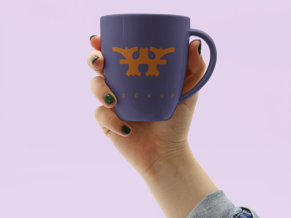 Hand Holding Mug Mockup