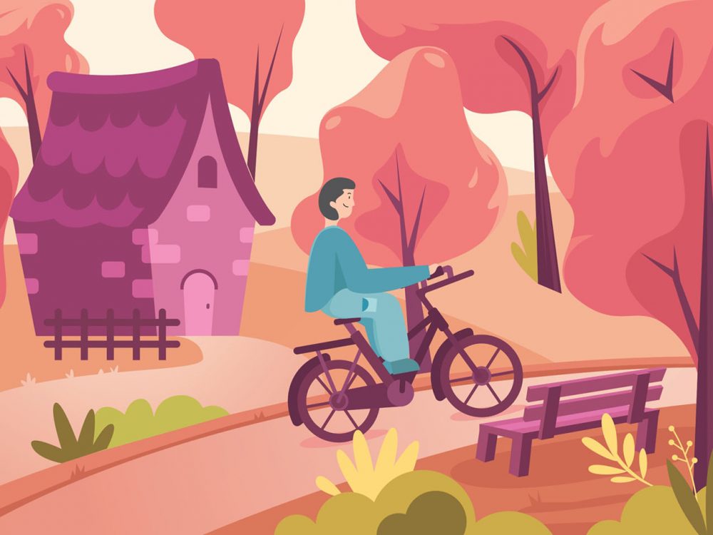 Boy Rides a Bike in Autumn Forest