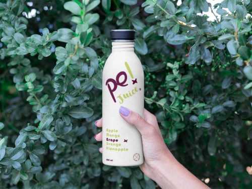 Hand Holding Bottle Mockup