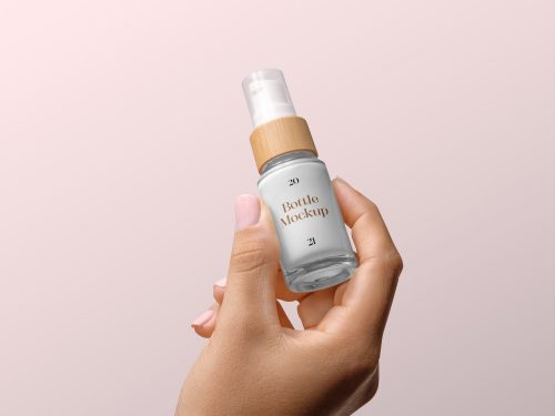 Bottle with Woman Hand Mockup