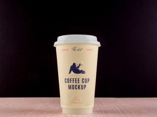 Big Coffee Cup on Desk Mockup