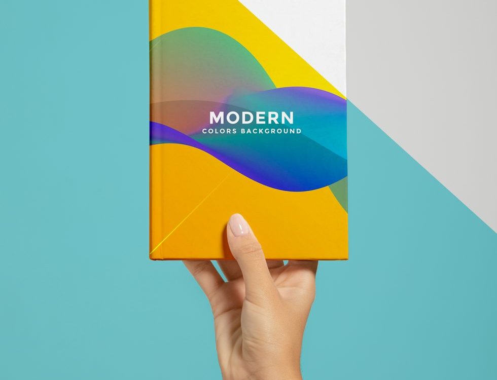 Hand Holding Book Mockup