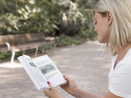 Woman on Street Reading Book Mockup