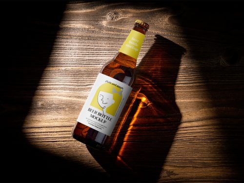 Beer Bottle on Wooden Background Mockup