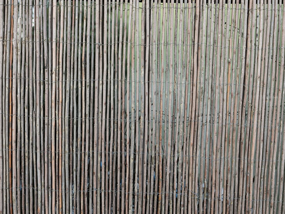 Aged Wooden Wall with Twigs Texture