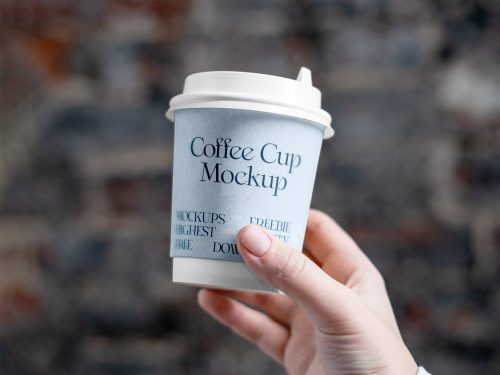 Coffee Cup in Hand Mockup