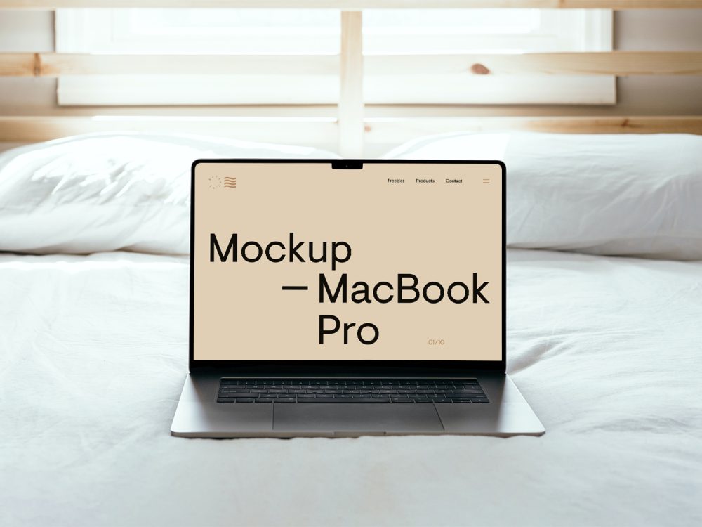 MacBook Pro on Bed Free Mockup