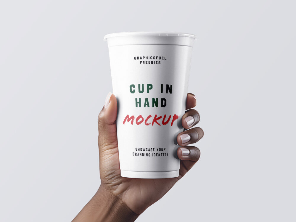 Coffee Cup in Hand Free Mockup